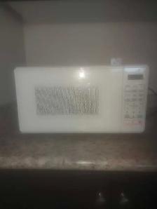 Used microwave for sale in good condition.