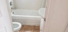 Bright 2-Bed Duplex Apartment with Sunroom | All Utilities Inclu - Photo 2