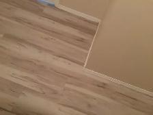 a Brand new glue down vinyl planks-ideal for basement water resi - Photo 9