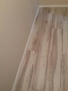 a Brand new glue down vinyl planks-ideal for basement water resi - Photo 10