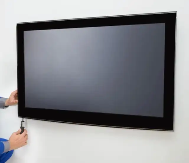 installation de télévision au mur. (438)738-7323