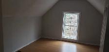 Bright 2-Bed Duplex Apartment with Sunroom  Utilities Included - Photo 4