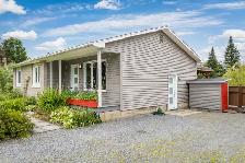 Plain-pied à vendre Sutton – 4 chambres – terrain 16 147 pi² – 5 - Photo 4