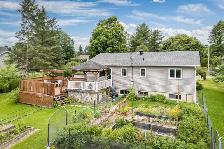 Plain-pied à vendre Sutton – 4 chambres – terrain 16 147 pi² – 5 - Photo 9