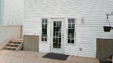 Spacious Split Level 1 Bedroom Basement with Storage & Fireplace - Photo 10