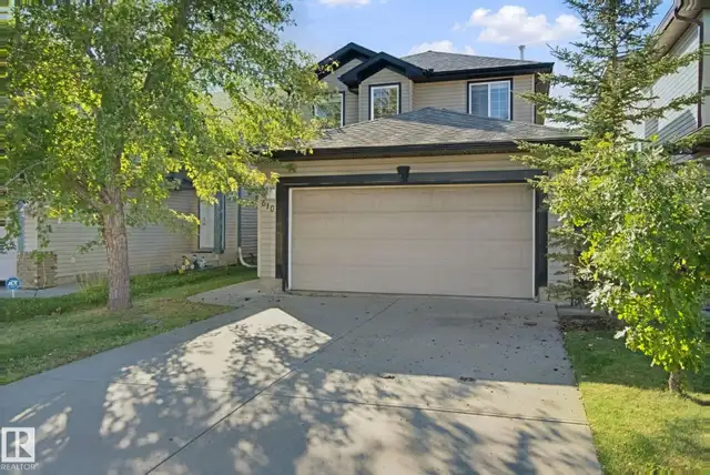 Ellerslie 4 Bed Home Backing Green Belt with Massive Deck