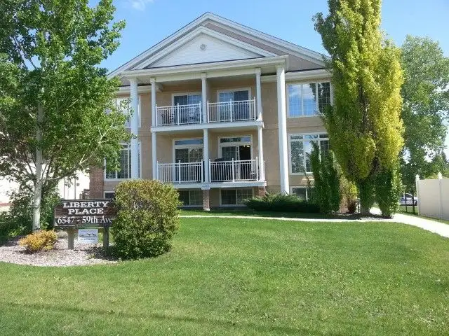 Spacious 2 Bed Apt with Covered Parking - Small Pet Friendly!