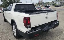 This Pickup powered by a Gasoline engine featuring 4WD/4-Wheel D - Photo 4