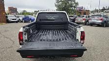 This Pickup powered by a Gasoline engine featuring 4WD/4-Wheel D - Photo 5