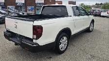 This Pickup powered by a Gasoline engine featuring 4WD/4-Wheel D - Photo 6