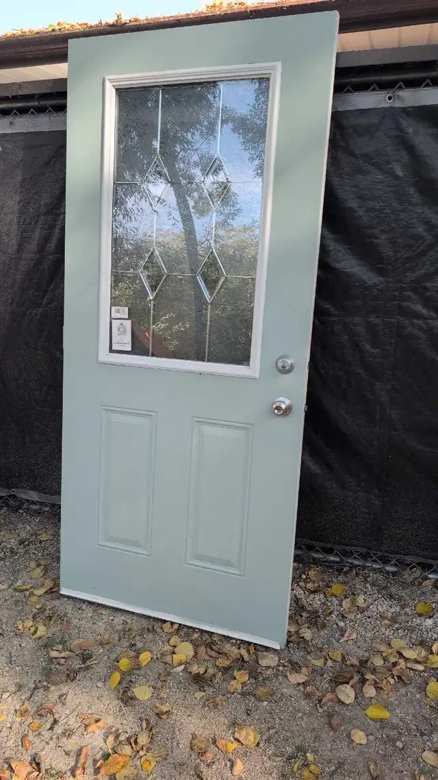 36'x 80' steel insulated door with decorative window