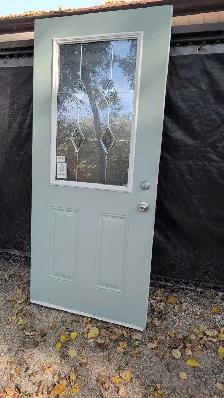 36'x 80' steel insulated door with decorative window