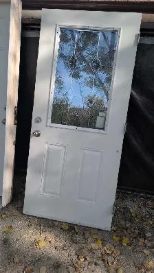 36'x 80' steel insulated door with decorative window - Photo 2
