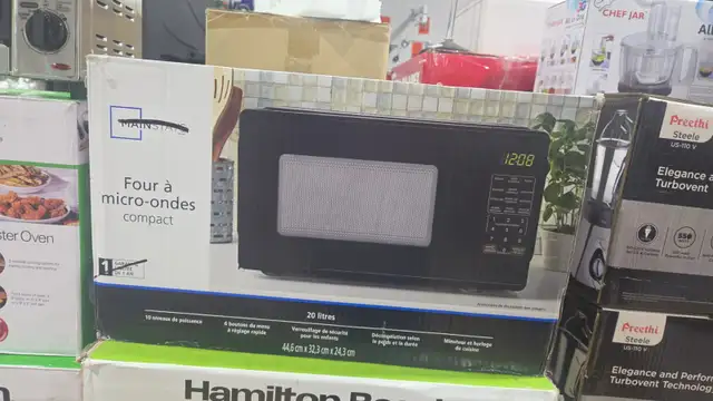 MAINSTAYS COMPACT 0.7 CUFT MICROWAVE OVEN BLACK COLOR