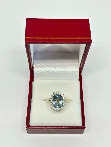 14k Blue Topaz Halo Diamond Ring
