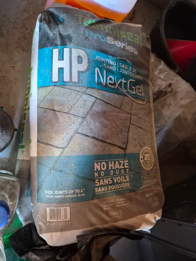 TWO BAGS AND A PART BAG OF PRO SERIES POLYMERIC SAND