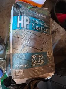 TWO BAGS AND A PART BAG OF PRO SERIES POLYMERIC SAND