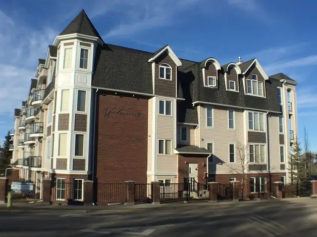 Exquisite Sylvan Lake Condo with Underground Parking!