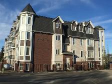 Exquisite Sylvan Lake Condo with Underground Parking!