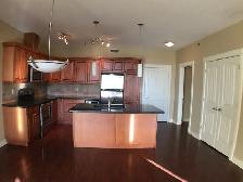 Exquisite Sylvan Lake Condo with Underground Parking! - Photo 2