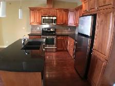 Exquisite Sylvan Lake Condo with Underground Parking! - Photo 3