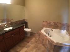 Exquisite Sylvan Lake Condo with Underground Parking! - Photo 8