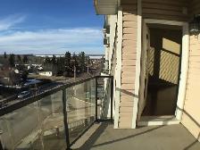 Exquisite Sylvan Lake Condo with Underground Parking! - Photo 12