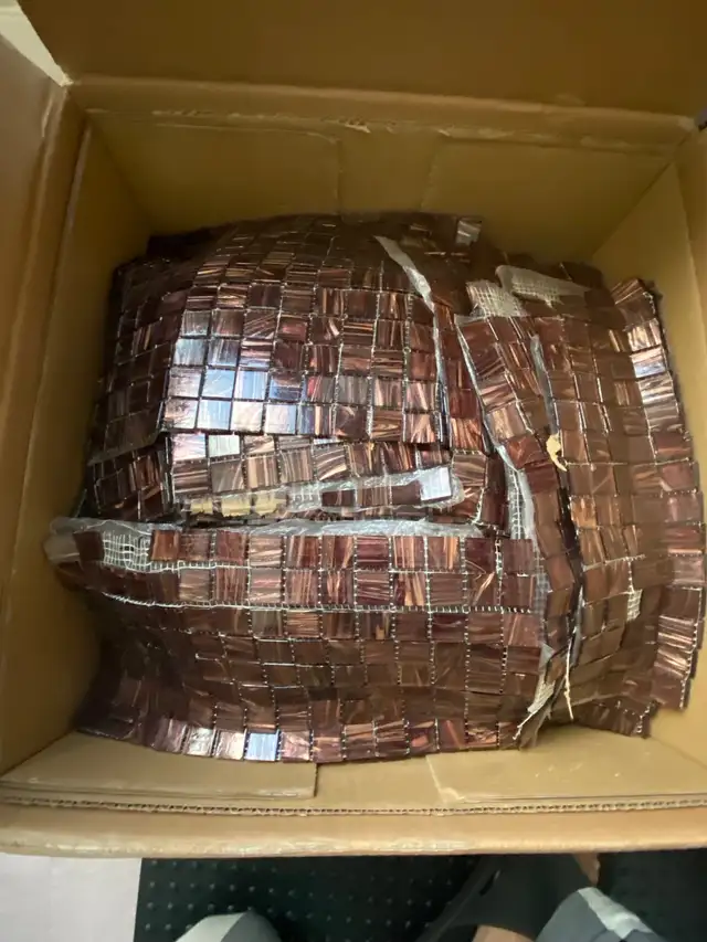 Brown backsplash never use in box weighs approximately 75 lbs