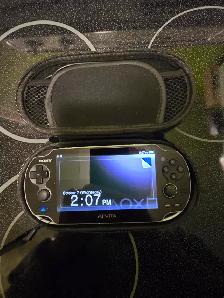 PS Vita 1000 OLED — Modded, 128GB, Hundreds of Games