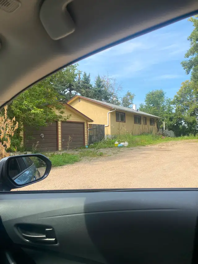Double unheated garage in the country in the city SW Edm