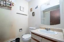 One Bedroom and Den Garden Apartment - Photo 9