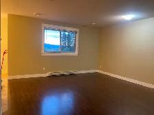 Bright & Spacious 2-Bedroom Legal Suite - Photo 6