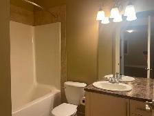 Bright & Spacious 2-Bedroom Legal Suite - Photo 9