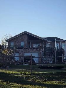 GORGEOUS Raised Bungalow on 40 Acres
