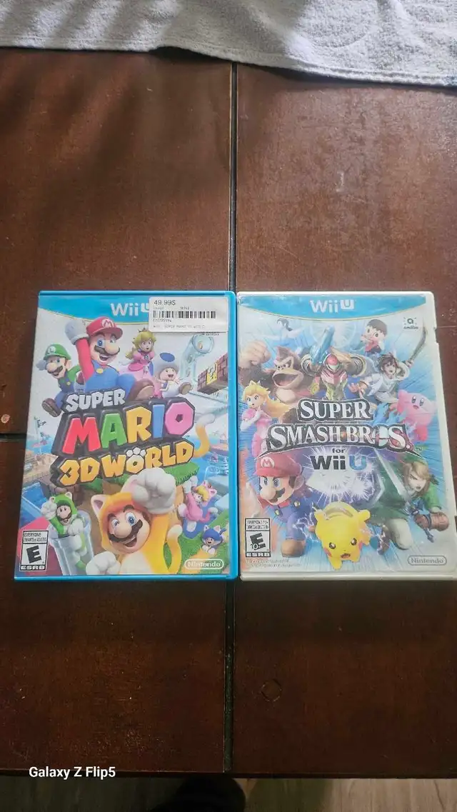 2 Jeux Wii U (Super Smash Bross   Super Mario 3D World)