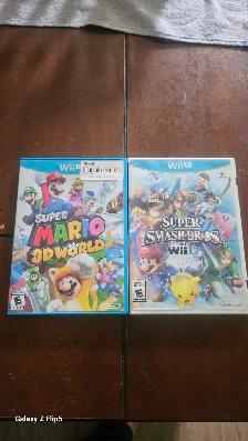 2 Jeux Wii U (Super Smash Bross   Super Mario 3D World)