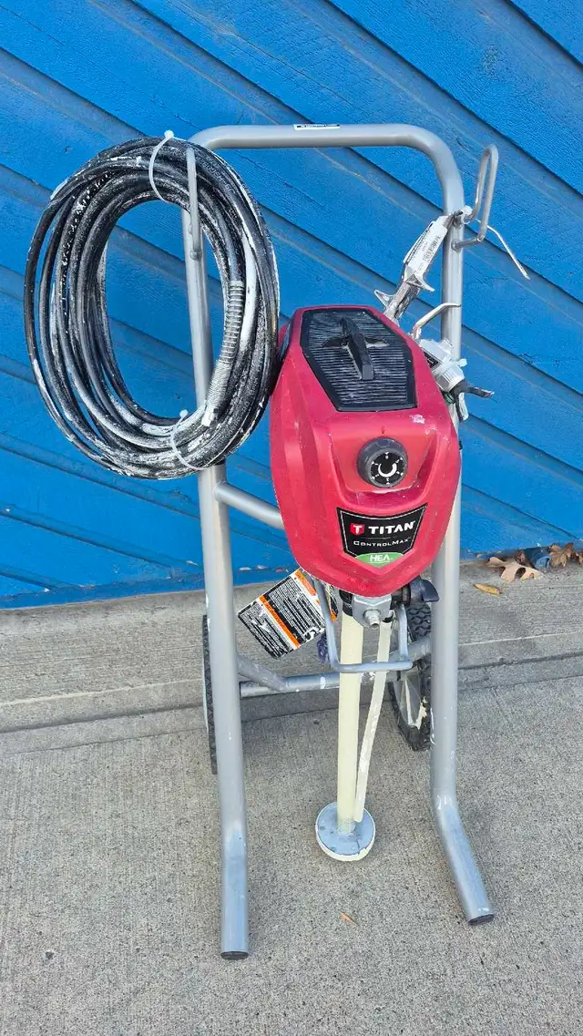 Titan 1900 Pro paint sprayer with hose as is, and paint gun