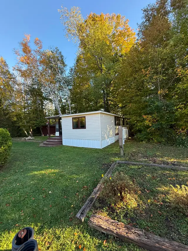 $69,900 | Fully Furnished Year-Round Lake Huron Retreat