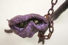 Chat sculpté dans une branche pour l'Halloween, Le chat
