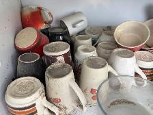 huge collection of old mugs / cups.