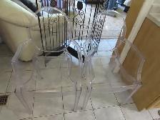 Clear Transparent Chairs set off two. Weight capacity 350lb.