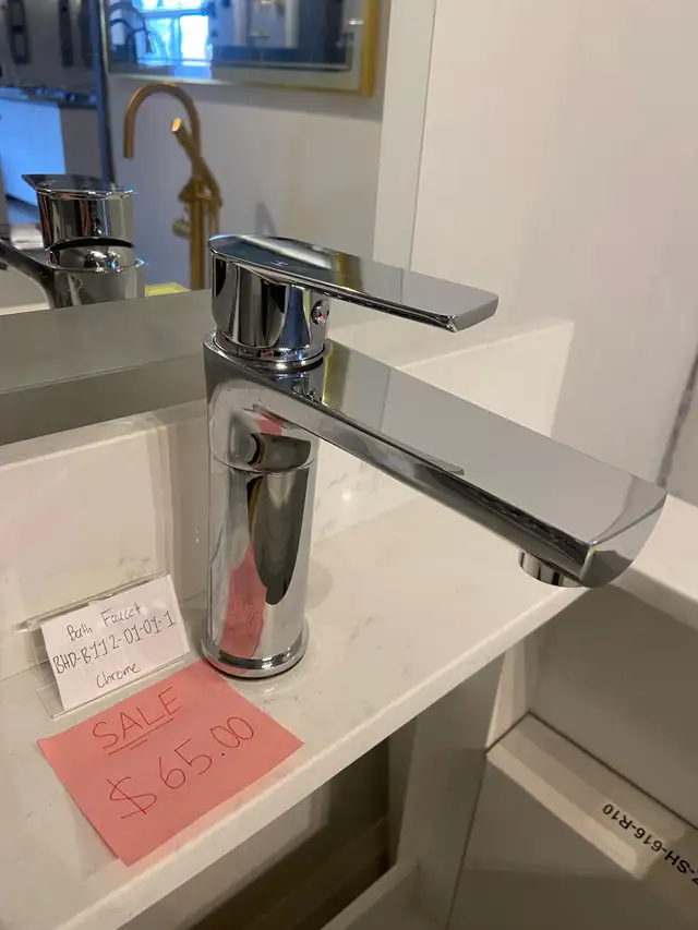 Chrome bathroom faucet- with pop up drain