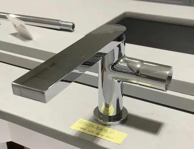 Chrome bathroom faucet- pop up drain included