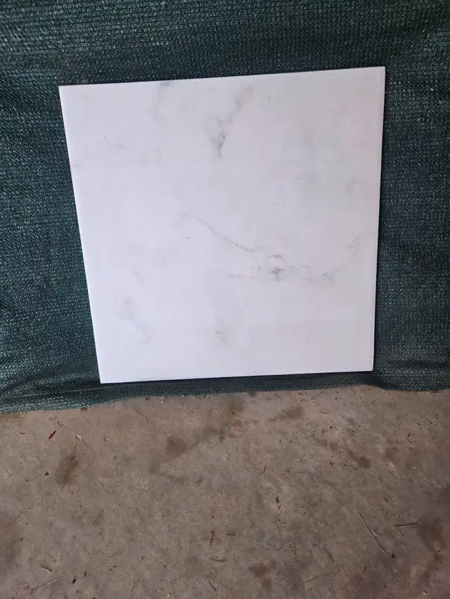 150 sq. ft. of ceramic floor tile -plus some more