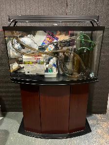 46 GALLON BOW FRONT FISH TANK FOR SALE.