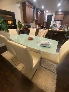 6 White Faux-Leather Dining Chairs — $20 each or $100 for all
