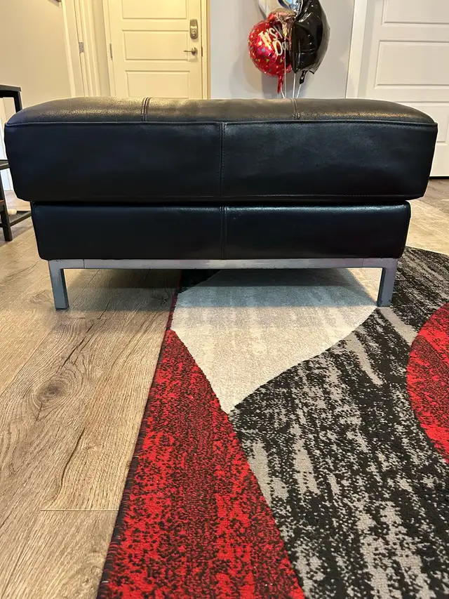BLACK LEATHER OTTOMANS