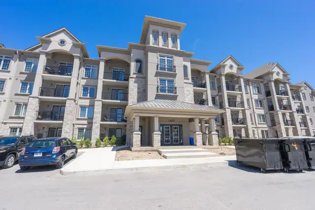 1 Bed   Large Den, 1 Bath Condo at Courtyards on Main Condos