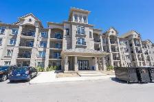 1 Bed   Large Den, 1 Bath Condo at Courtyards on Main Condos