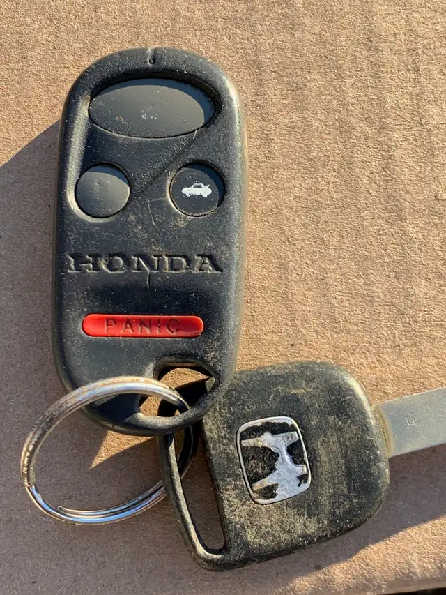 Honda 4 buttons keyless entry remote FOB.I don't do programming
